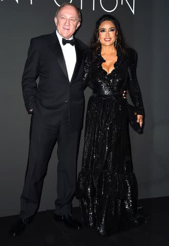 <p>Lionel Hahn/Getty Images</p> Salma Hayek and Francois-Henri Pinault at Cannes in 2023.