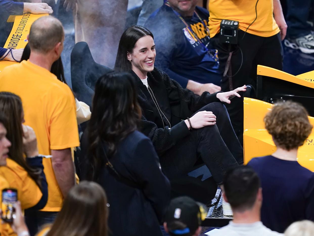 Caitlin Clark attends the Indiana Pacers' playoff game in April 2024.