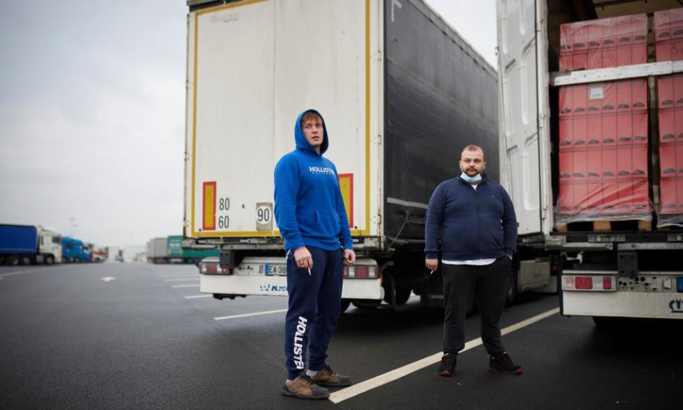 Truck drivers Michael Delattre, left, and Benjamin Brogniart