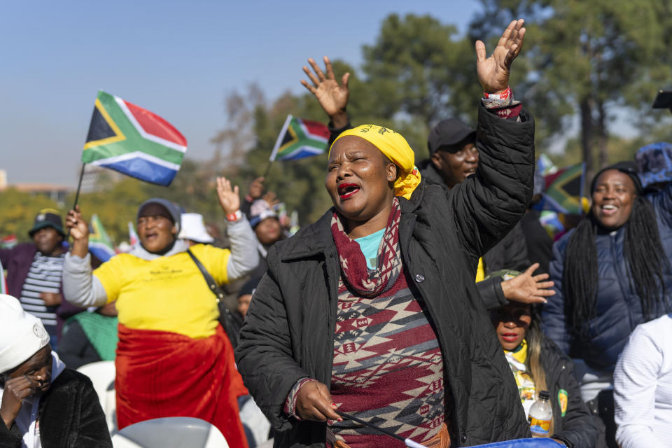 South Africans gather ahead of the inauguration of South Africa's Cyril Ramaphosa as President at the Union Buildings South Lawns in Tshwane, South Africa, Wednesday, June 19, 2024. (AP Photo/Jerome Delay)