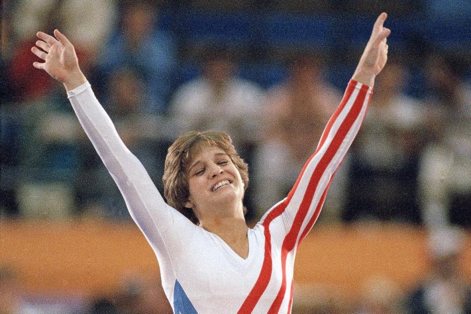 Mary Lou Retton celebrates her balance beam score at the 1984 Olympic Games in LA (Copyright 2024 The Associated Press. All rights reserved.)