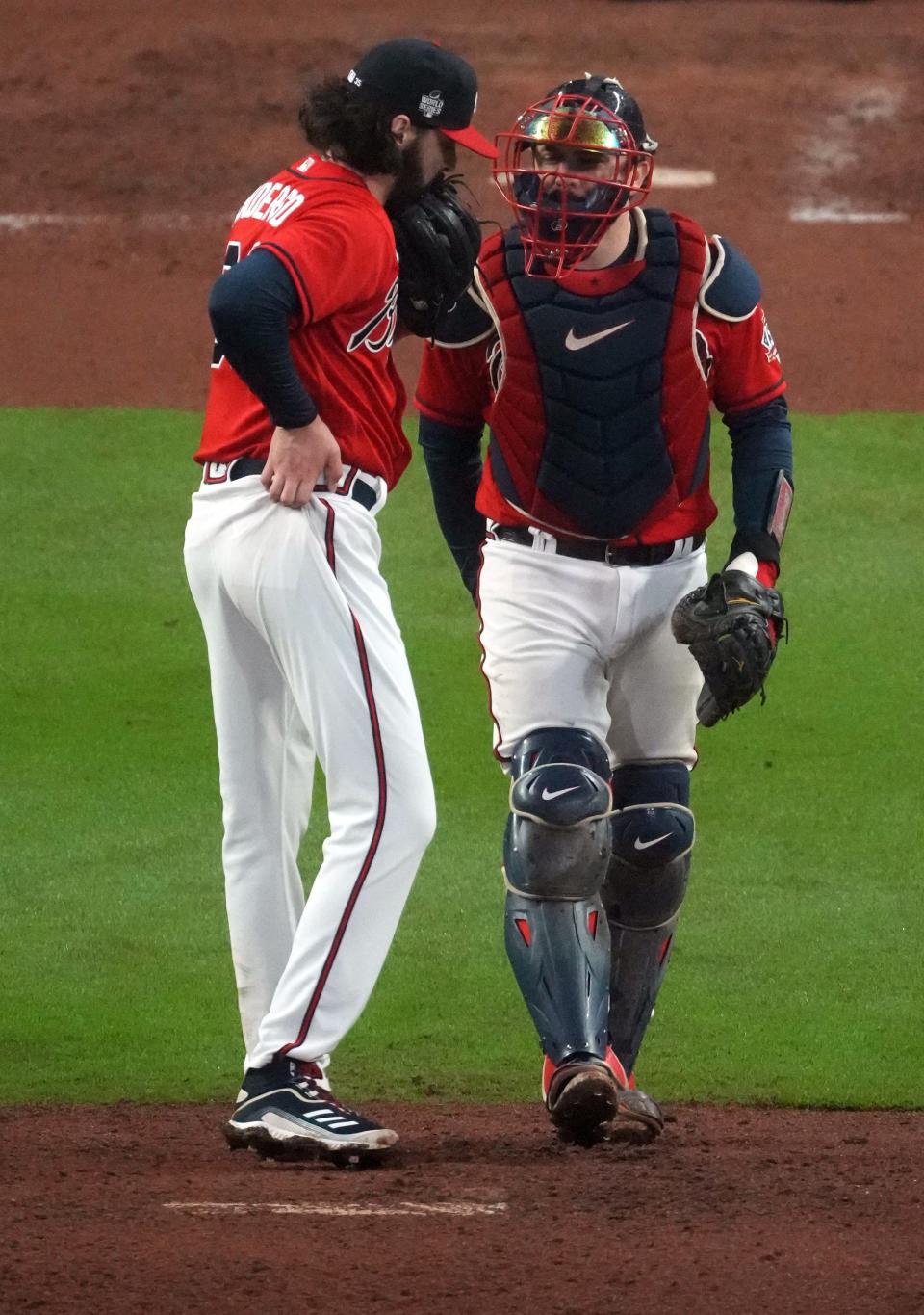 Ian Anderson and Travis d'Arnaud talk on the mount in the third inning of Game 3.