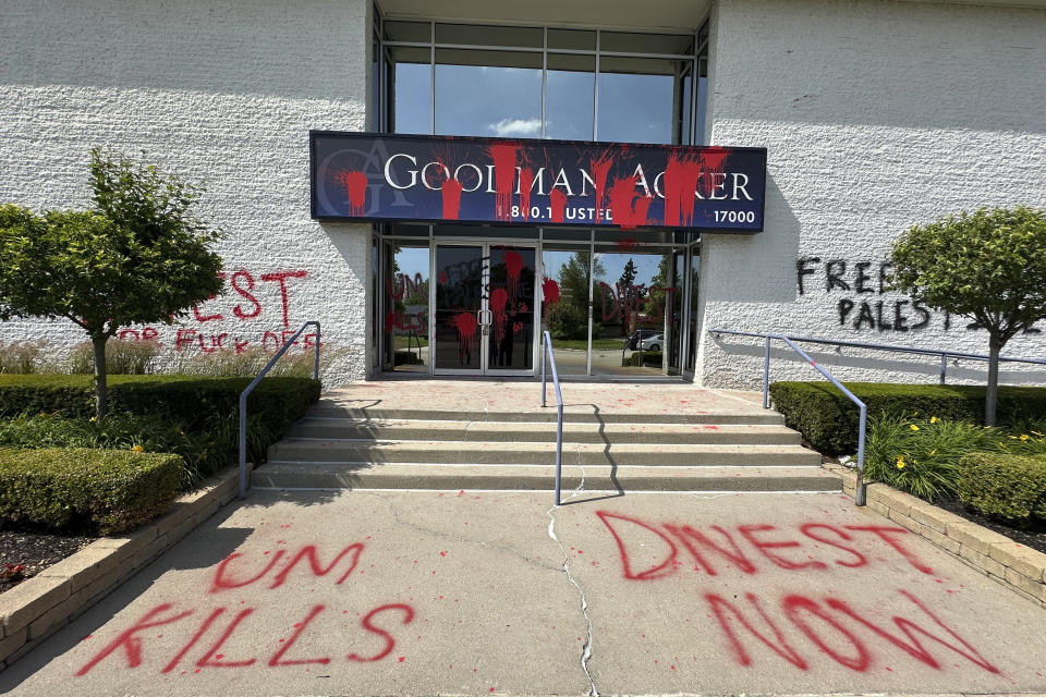 Pro-Palestinian graffiti mars the outside of the Goodman Acker law offices, Monday, June 3, 2024, in Southfield, Mich., just north of Detroit. Southfield police are investigating the vandalism as a hate crime. University of Michigan regent and attorney Jordan Acker called the vandalism "antisemitic." (AP Photo/Corey Williams)