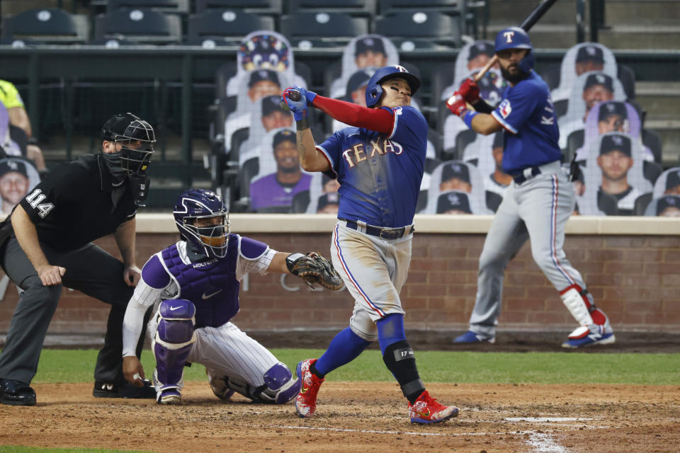 FILE - Texas Rangers left fielder Shin-Soo Choo (17) in the fifth inning of a baseball game on Aug. 15, 2020, in Denver. (AP Photo/David Zalubowski, File)