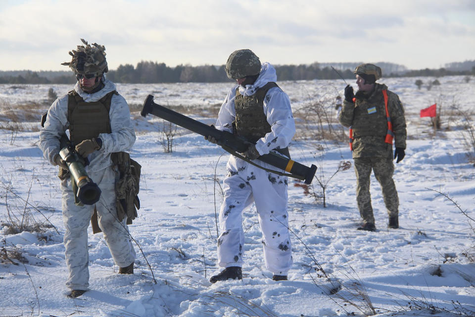 In this photo provided by the Ukrainian Defense Press Service and taken on Jan. 30, 2022, Ukrainian soldiers train using the US M141 Bunker Defeat Munition (SMAW-D) missiles at the Yavoriv military training ground, close to Lviv, western Ukraine. (Ukrainian Defense Ministry Press Service via AP)