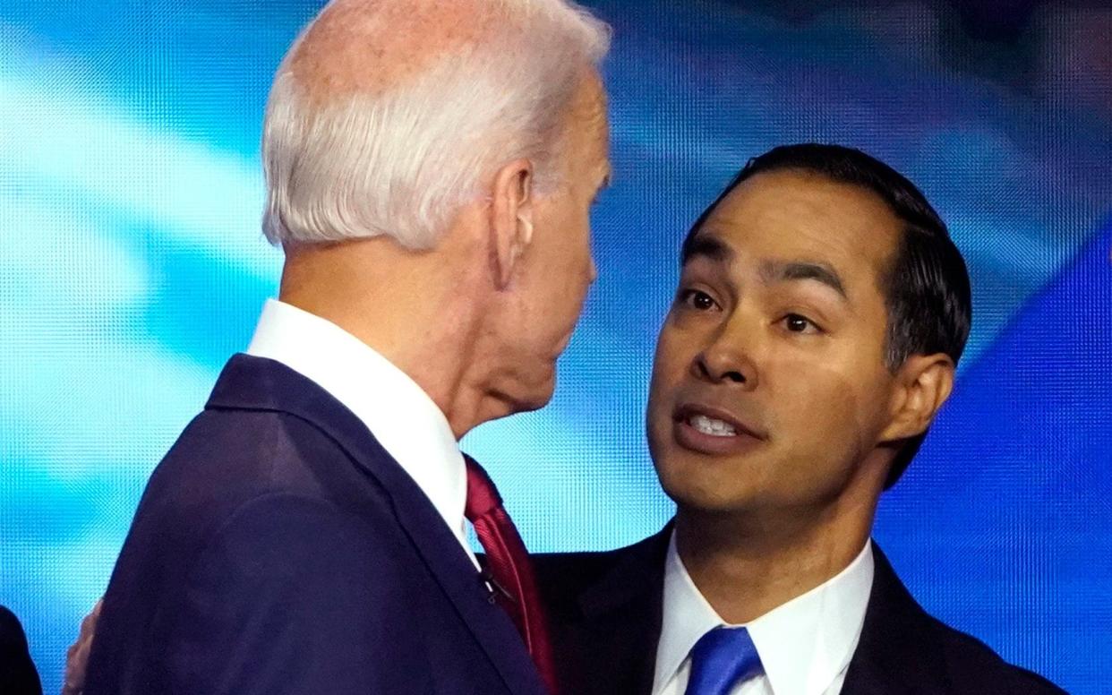 Joe Biden talks to Julian Castro after the debate - REUTERS