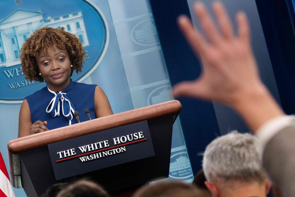 A reporter raises their hand for questions as Press Secretary Karine Jean-Pierre speaks during the daily press briefing at the White House in Washington, DC, on April 4, 2023 as former US President Donald Trump is arraigned in New York. (Photo by Jim WATSON / AFP) (Photo by JIM WATSON/AFP via Getty Images) ORIG FILE ID: AFP_33CM8GY.jpg