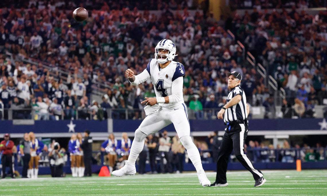 Dallas Cowboys quarterback Dak Prescott throws a touchdown pass to wide receiver CeeDee Lamb in the first quarter against the Philadelphia Eagles on Sunday, December 10, 2023, at AT&T Stadium in Arlington.