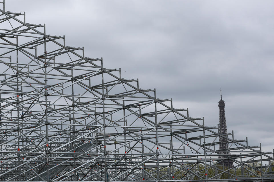 The Eiffel Tower appears behind constructions for the Olympic Games,, Thursday, April 11, 2024 on the Place de la Concorde in Paris. Place de la Concorde, or Concorde square, will host the 3x3 Basketball, BMX freestyle, Breaking and Skateboarding during the Paris 2024 Olympic Games. (AP Photo/Aurelien Morissard, File)