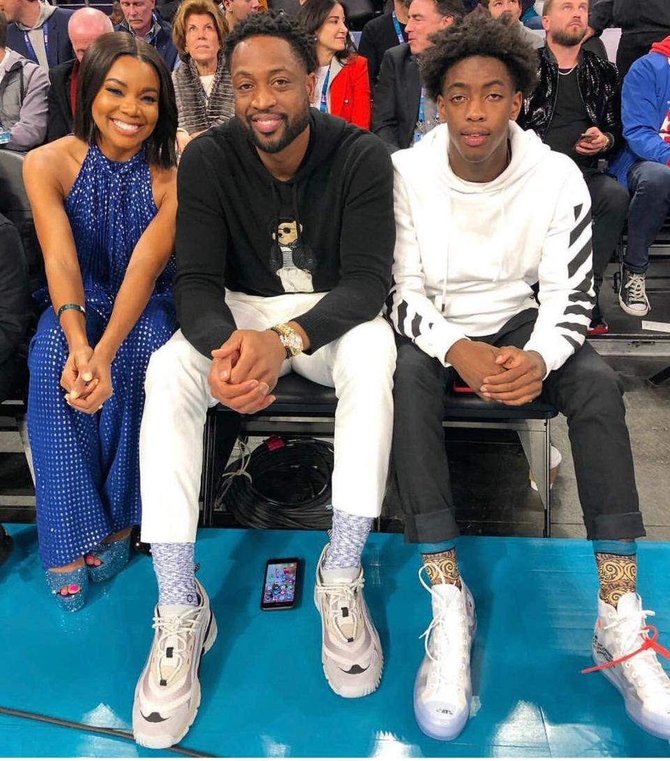 Gabrielle, Dwyane and Zaire sat courtside at All-Star Weekend in Feb. 2019. 