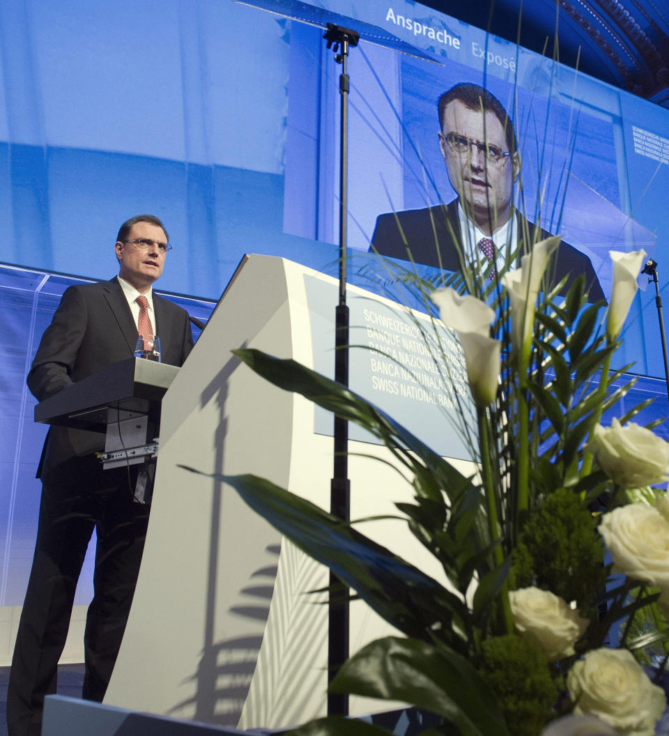 Director of the Swiss National Bank Thomas Jordan delivers a speech during a shareholders meeting in Bern, Switzerland, April 27, 2012. Jordan expects a growth rate of about 1 percent for 2012, causing a rise in unemployment but no risk of inflation for now. The outlook from the new chairman of the Swiss National Bank for a nation whose currency serves as a safe haven amid the economic turmoil of Europe and the United States also included a bit of subdued optimism globally. (AP Photo/Keystone, Lukas Lehmann)