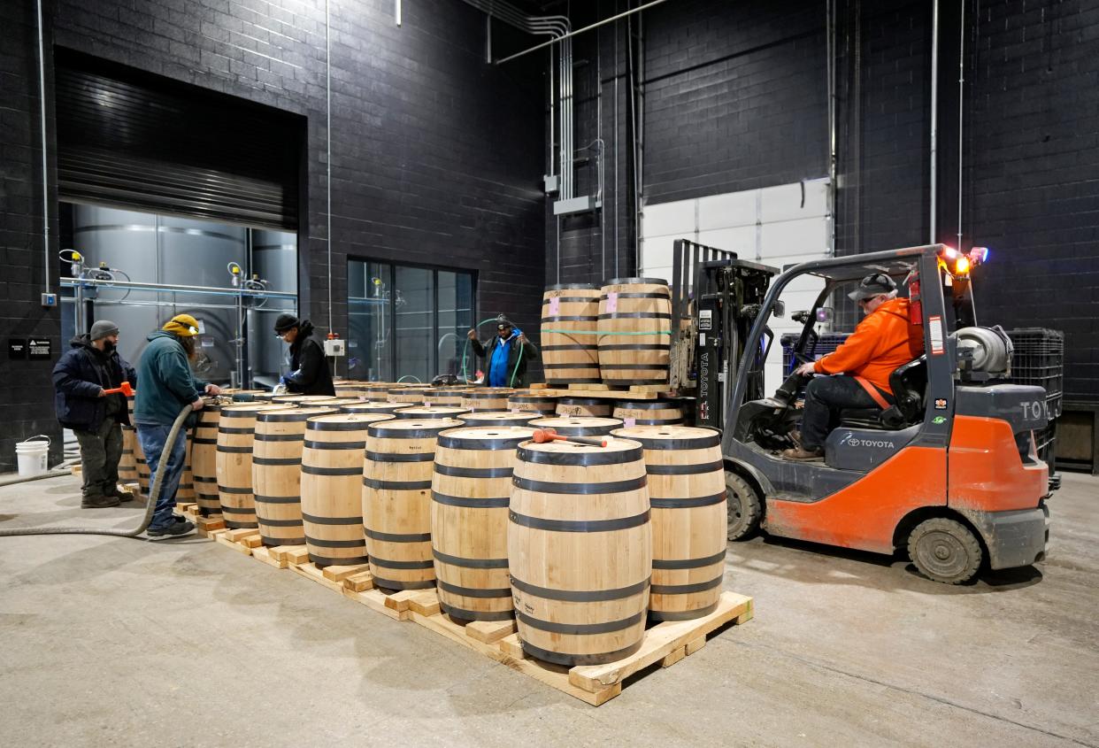 Barrels are filled with whiskey in Middle West Spirits' new distillery on Alum Creek Drive.