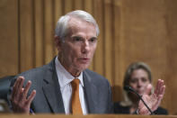 Sen. Rob Portman, R-Ohio, speaks during a Senate Homeland Security Committee hearing at the Capitol in Washington, Thursday, June 10, 2021. Portman is working with a bipartisan group of 10 senators negotiating an infrastructure deal with President Joe Biden. (AP Photo/J. Scott Applewhite)