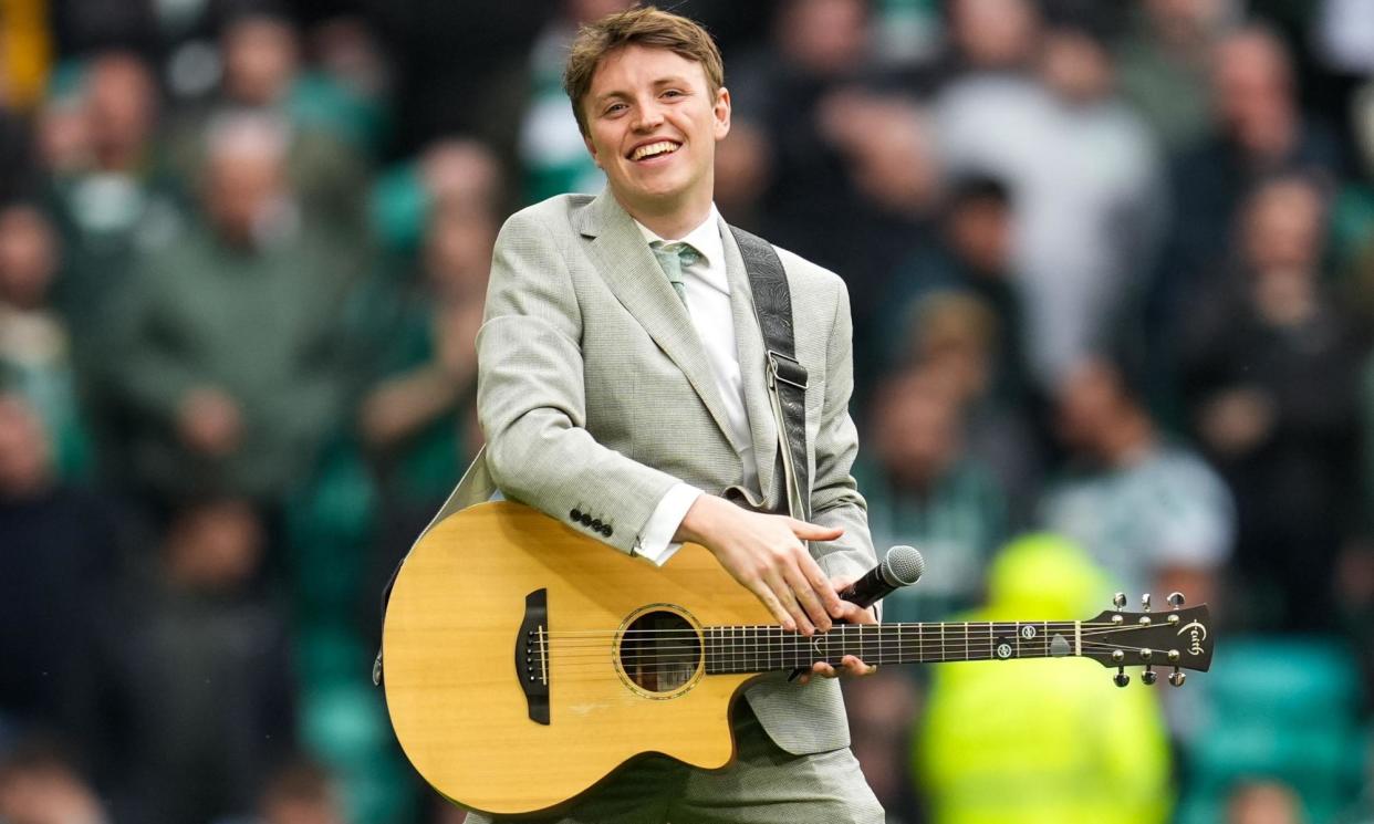 <span>Daniel Rooney on the pitch at Celtic Park at half-time during the Celtic v Hearts match on 4 May, the day after appearing at a Take That gig in Glasgow.</span><span>Photograph: Stuart Wallace/Rex/Shutterstock</span>