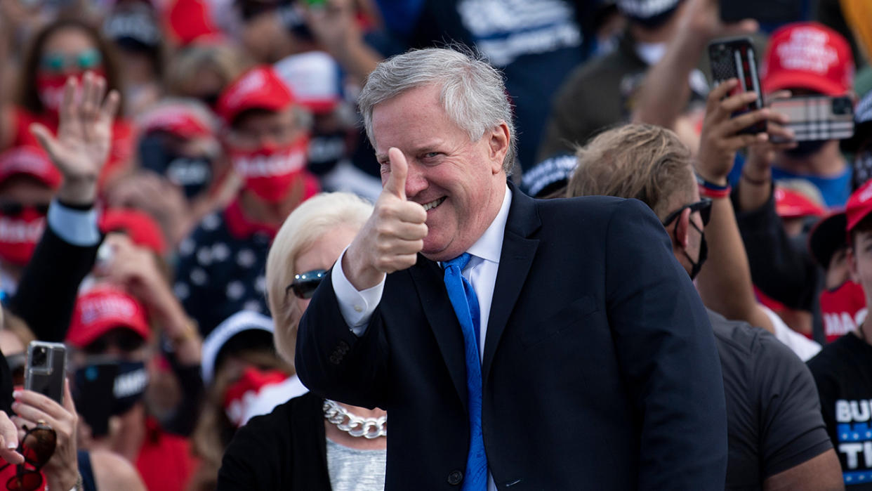 Mark Meadows gives a thumbs-up sign at a rally.