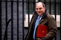 FILE PHOTO: Britain's Defence Secretary Ben Wallace walks outside Downing Street in London