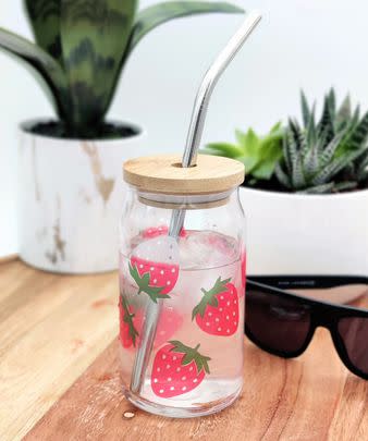 A color-changing strawberry glass that comes to life when filled with a cold beverage!