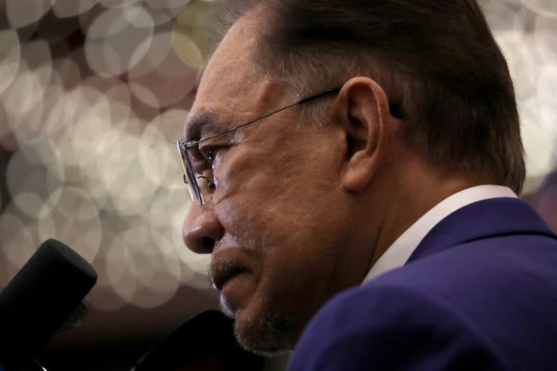 Malaysia opposition leader Anwar Ibrahim attends a news conference in Kuala Lumpur