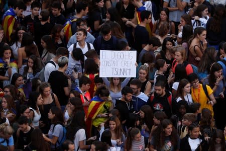 People gather for a protest in Barcelona