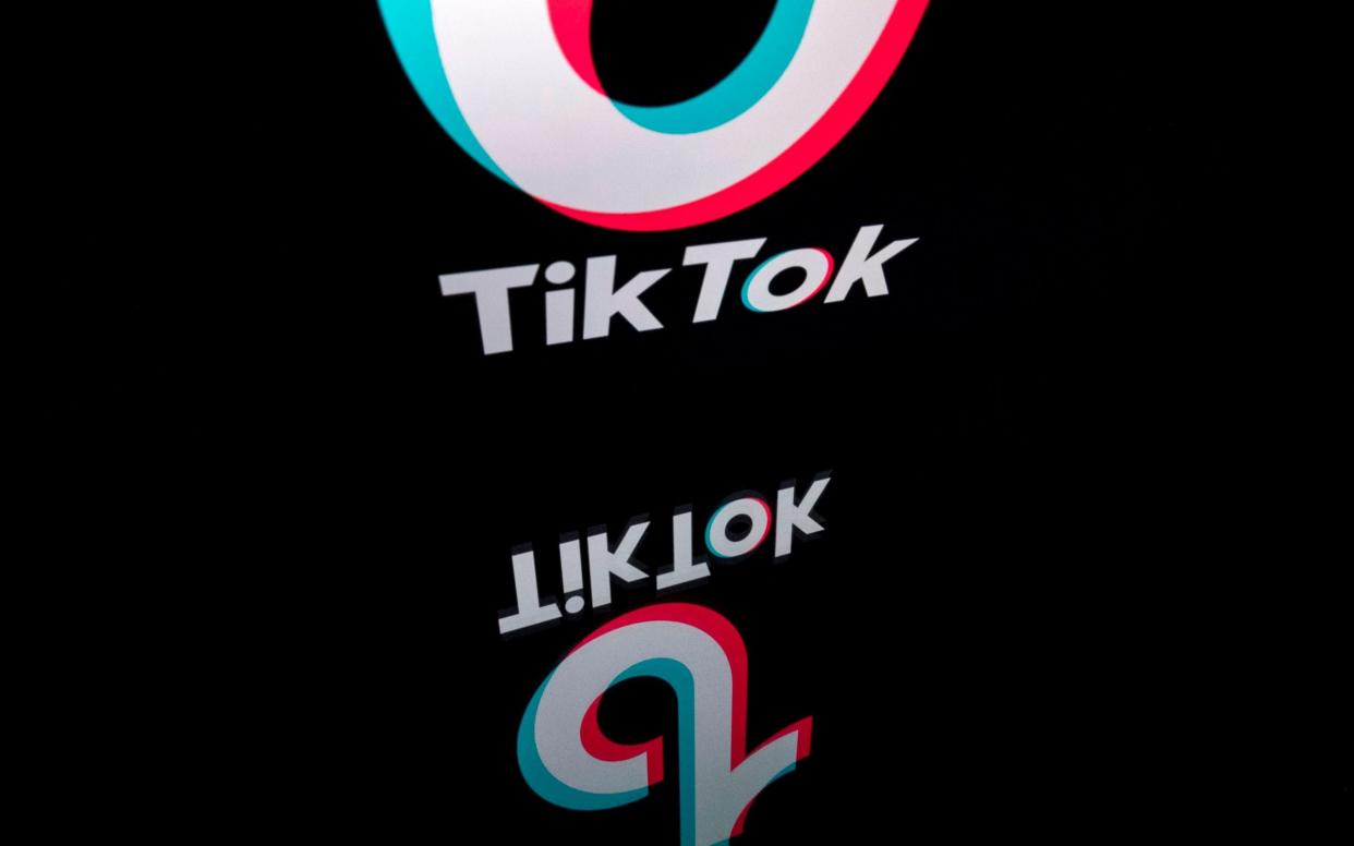 The logo of the social media video sharing app Tiktok displayed on a tablet screen in Paris - AFP 