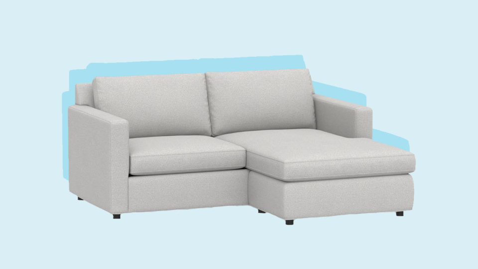 This sectional sofa is available in two sizes.