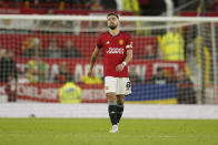 Manchester United's Bruno Fernandes reacts after Manchester City's Erling Haaland scored his side's second goal during the English Premier League soccer match between Manchester United and Manchester City at Old Trafford stadium in Manchester, England, Sunday, Oct. 29, 2023. (AP Photo/Dave Thompson)