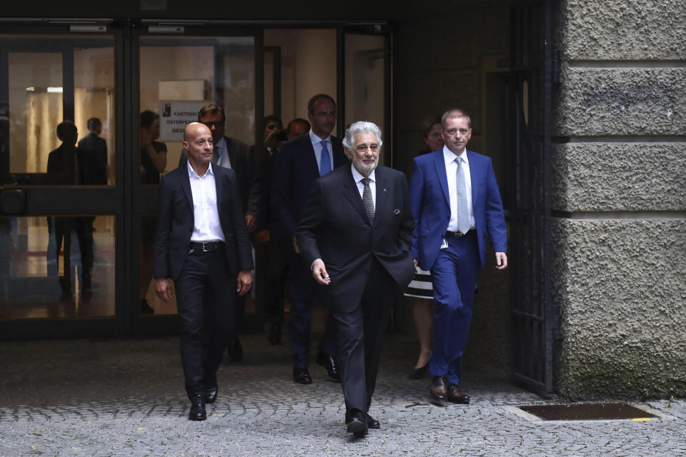 Placido Domingo leaves the 'Festspielhaus' opera house after he performed 'Luisa Miller' by Giuseppe Verdi in Salzburg, Austria, Sunday, Aug. 25, 2019. Domingo is scheduled to appear onstage at the Salzburg Festival to perform for the first time since multiple women have accused the opera legend of sexual harassment in allegations brought to light by The Associated Press. (AP Photo/Matthias Schrader)