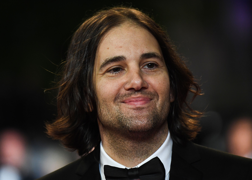 David Robert Mitchell poses for a photo at Cannes.