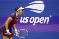 Bianca Andreescu, of Canada, reacts during her match against Maria Sakkari, of Greece, during the fourth round of the US Open tennis championships, Tuesday, Sept. 7, 2021, in New York. (AP Photo/John Minchillo)