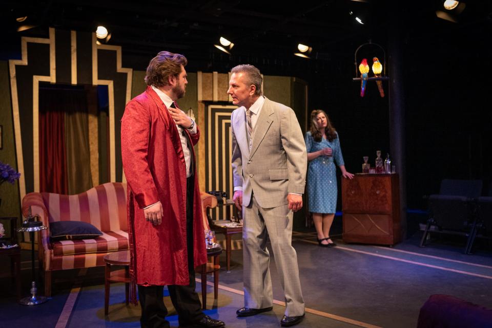 Robert Tombari, left, as Garry Essendine, Lee Lodyga, as Morris Dixon, and Abbey Platt, as Liz Essendine, rehearse a scene for South Bend Civic Theatre's production of Noël Coward's "Present Laughter" that opens Feb. 10 and continues through Feb. 19, 2023, at the theater in downtown South Bend.