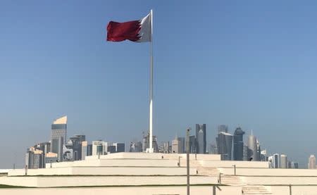 The Qatari flag is seen at a park near Doha Corniche, in Doha, Qatar February 17, 2018. Picture taken February 17, 2018. REUTERS/Ibraheem al Omari