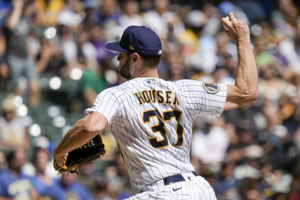 Milwaukee Brewers starting pitcher Adrian Houser throws during the first inning of a baseball game against the San Diego Padres Sunday, Aug. 27, 2023, in Milwaukee. (AP Photo/Morry Gash)