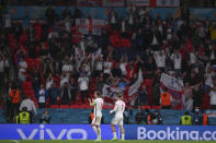 England's Harry Kane and Jack Grealish, right, applaud fans at the end of the Euro 2020 soccer championship group D match between Czech Republic and England, at Wembley stadium in London, Tuesday, June 22, 2021. England won 1-0. (AP Photo/Laurence Griffiths, Pool)
