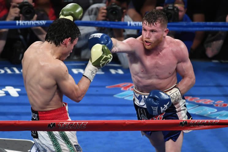 Canelo Alvarez (R) reaffirmed his position as boxing’s biggest draw by selling nearly 1 million pay-per-views for his bout with Julio Cesar Chavez Jr. (Getty Images)