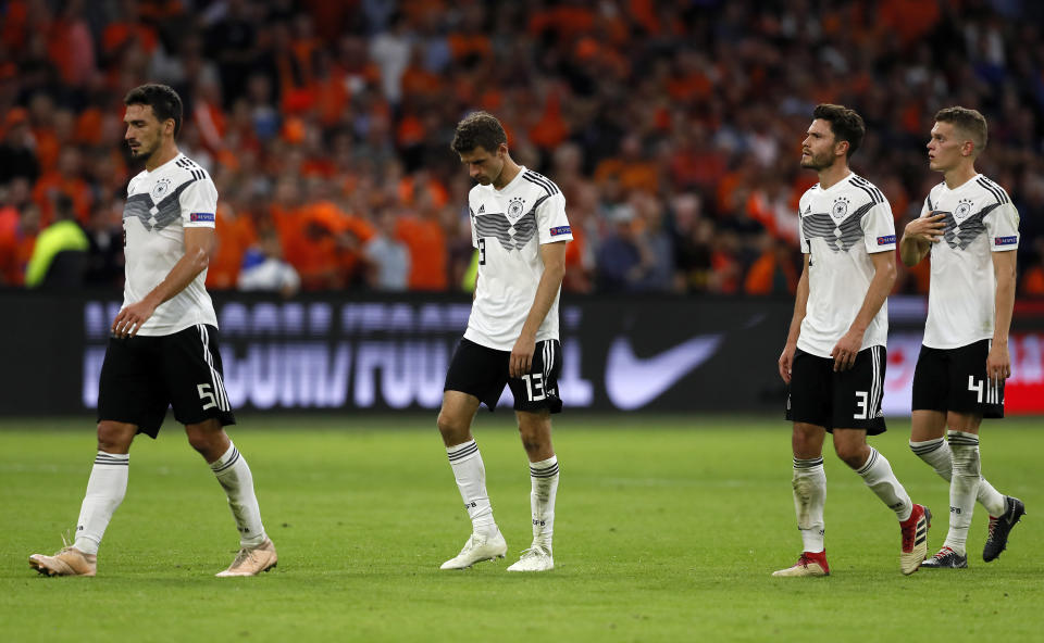 Germany's team leaves the pitch disappointed after losing the UEFA Nations League soccer match between The Netherlands and Germany at the Johan Cruyff ArenA in Amsterdam, Saturday, Oct. 13, 2018. The Netherlands defeated Germany with 3-0. (AP Photo/Peter Dejong)
