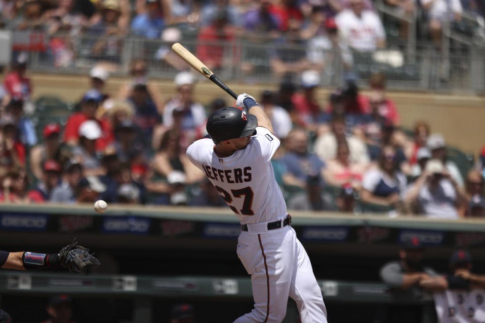 Minnesota Twins' Ryan Jeffers (27) strikes out during the first inning of a baseball game against the Cleveland Indians, Sunday, June 27, 2021, in Minneapolis. (AP Photo/Stacy Bengs)