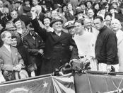 FILE - In this Oct. 5, 1933, file photo, President Franklin D. Roosevelt prepares to throw out the ceremonial first pitch at at Griffith Stadium in Washington, before Game 3 of baseball's World Series as Washington Senators manager Joe Cronin, third from right, and New York Giants manager Bill Terry, second from right, look on. The President uncorked an almost wild throw that sent the players scrambling. (AP Photo/File)