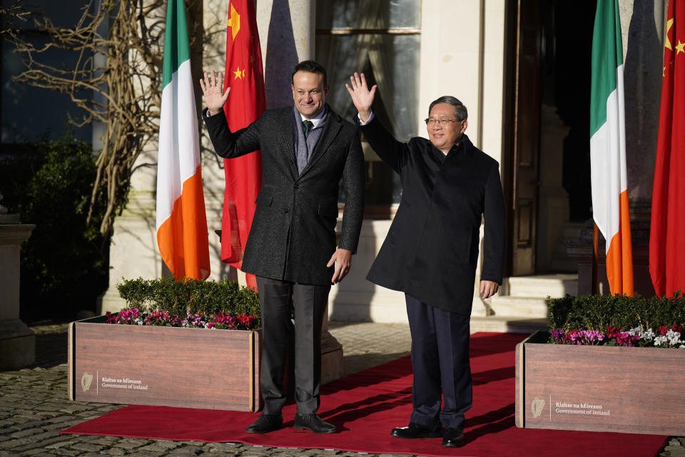 Ireland's Prime Minister Leo Varadkar, left, and Chinese Premier Li Qiang waves during their meeting in Dublin, Ireland, Wednesday, Jan. 17, 2024. (Niall Carson/PA via AP)