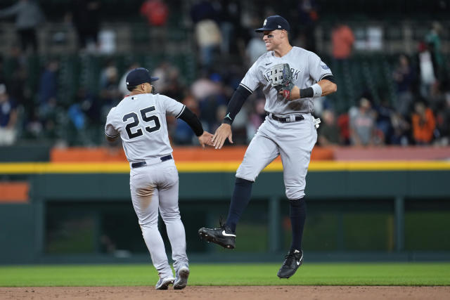 The New York Yankees celebrate their win after a baseball game