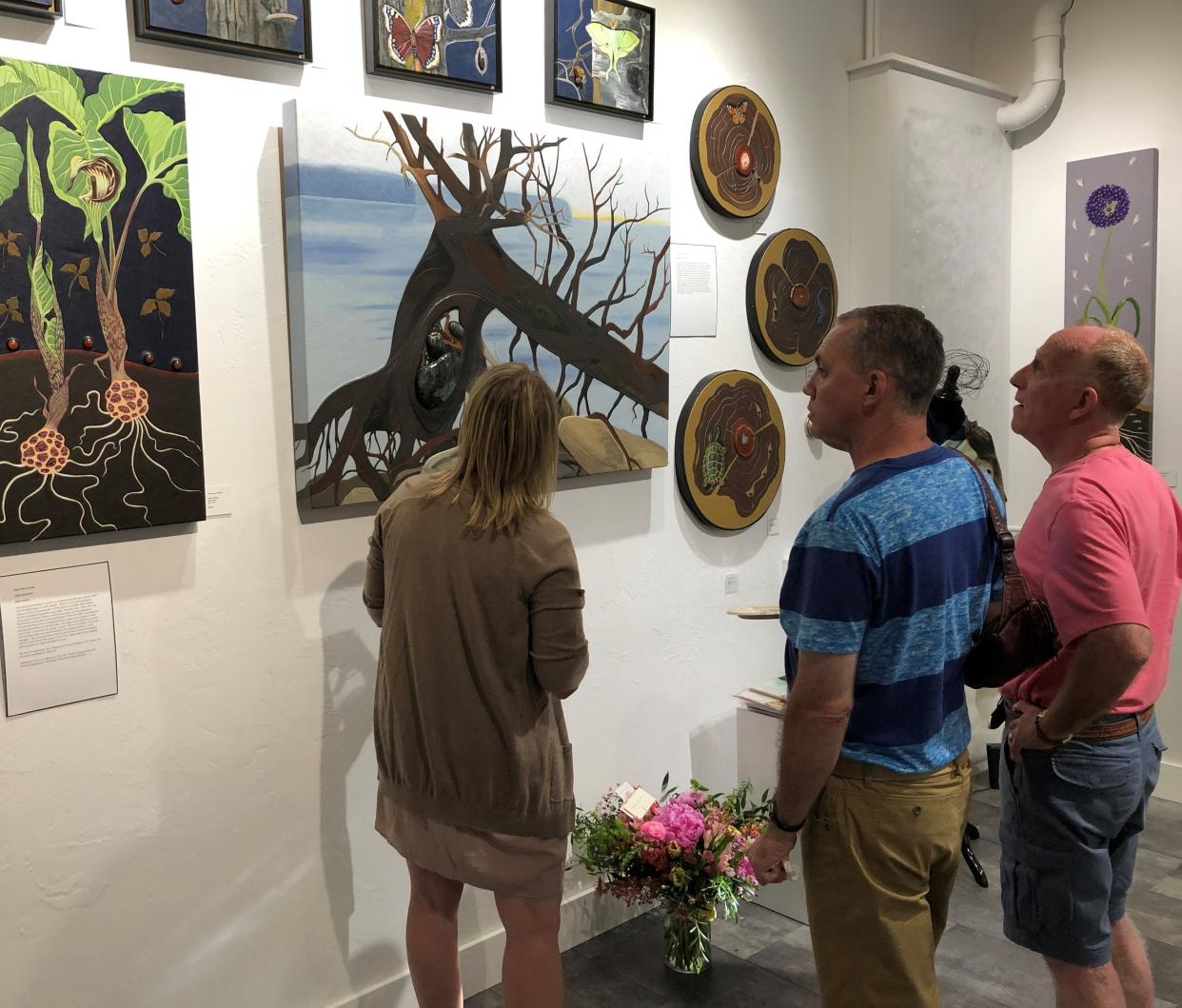 Visitors to Turtle Ridge Gallery/Boutique look over some of the art on display and for sale during a past Ellison Bay Spring Art Crawl. This year's annual crawl takes place May 18 and 19.