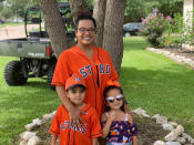 This undated photo provided by Maria Castillo shows Castillo, center, with her son Josiah McIntyre, left, and daughter Alayna Flores. A Houston-area official said Monday, Sept. 28, 2020, it will take 60 days to ensure a city drinking water system is purged of a deadly, microscopic parasite that doctors believed killed Josiah McIntyre and that led to warnings for others not to drink tap water. (Courtesy of Maria Castillo via AP)