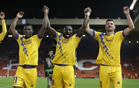 Football - Liverpool v FC Sion - UEFA Europa League Group Stage - Group B - Anfield, Liverpool, England - 1/10/15 Sion's Ebenezer Assifuah, Pa Modou Jagne and Vero Salatic celebrate after the game Reuters / Phil Noble Livepic