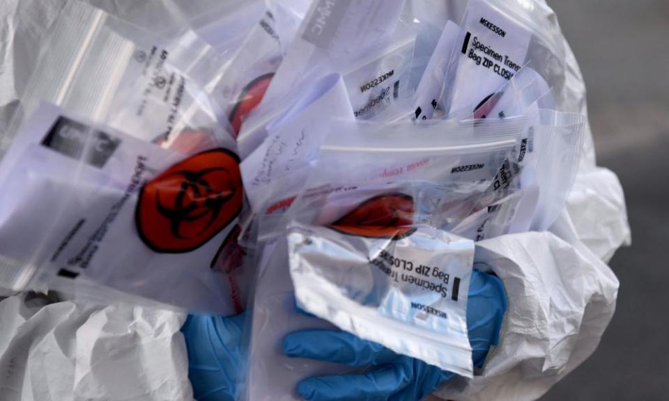 A medical worker at a busy testing sight in Houston, Texas, on 7 July.