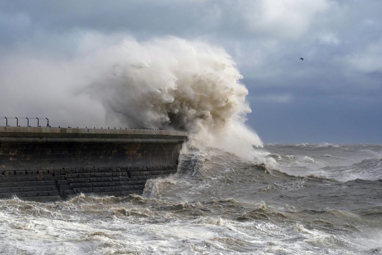 Waves crash over Dover harbour wall as Storm Ciaran batters the UK (PA)