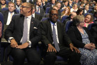 From left, Britain's Foreign Secretary James Cleverly, Britain's Chancellor of the Exchequer Kwasi Kwarteng and Health Secretary Therese Coffey wait for Britain's Prime Minister Liz Truss to make a speech at the Conservative Party conference at the ICC in Birmingham, England, Wednesday, Oct. 5, 2022. (AP Photo/Kirsty Wigglesworth)