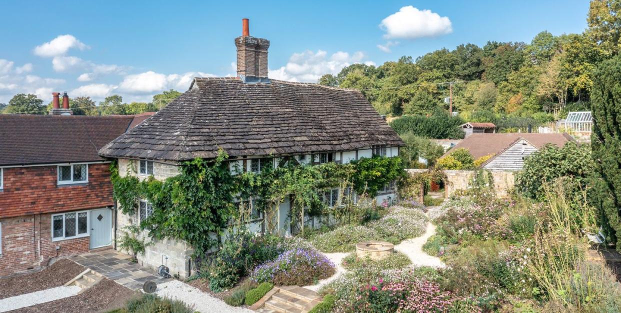 a house with a garden in front of it