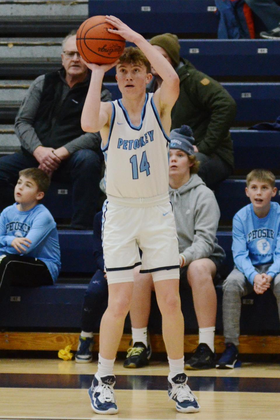 Petoskey's Dylan Odenbach lines up a corner 3-pointer in the second half Tuesday vs. TC West.
