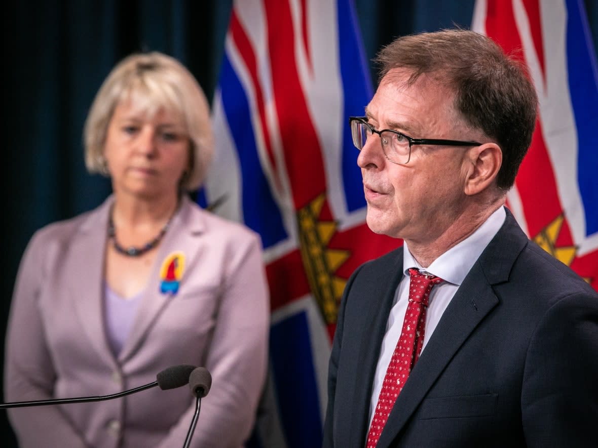 B.C. Health Minister Adrian Dix and Provincial Health Officer Bonnie Henry, seen at a press conference on Oct. 5, 2021, stressed the importance of vaccination on Friday as Omicron case numbers make testing and contact tracing all possible COVID-19 cases challenging. (Mike McArthur/CBC - image credit)