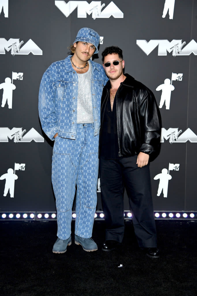 Joe Hegyes and Andrew Muscarella in contrasting outfits