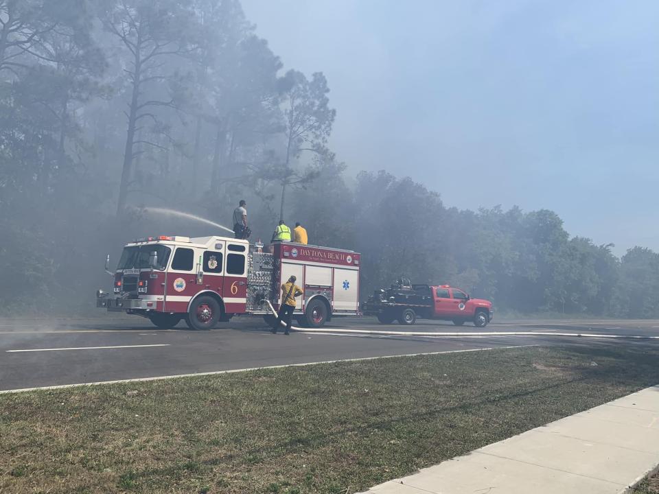 A brush fire caused the closure of a major Daytona Beach road Wednesday afternoon.